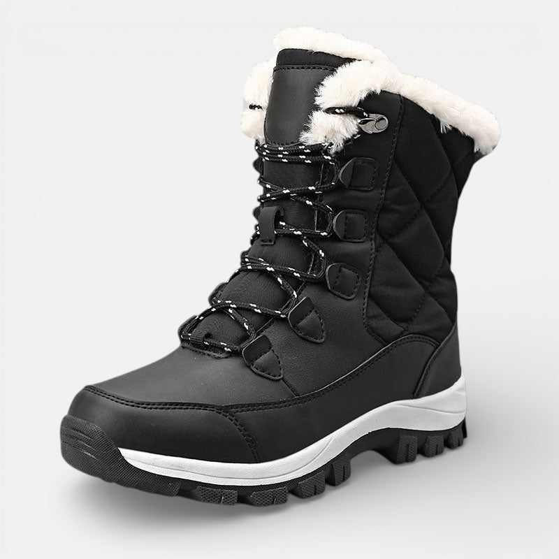 Women's winter boots in black, quilted lace up with faux fur collar