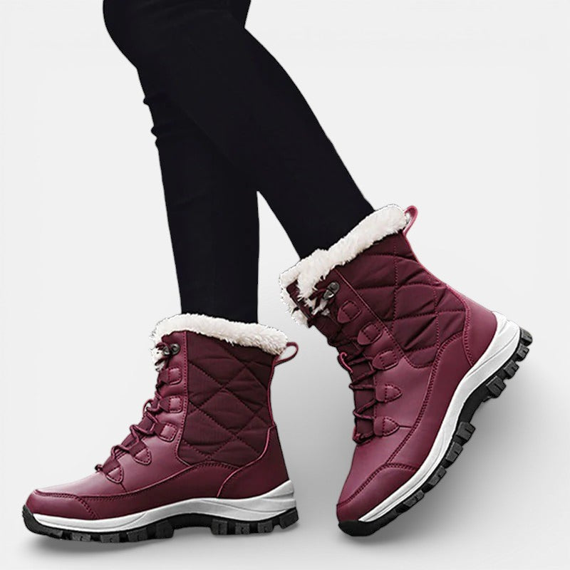 Burgundy lace up winter boots worn with leggings