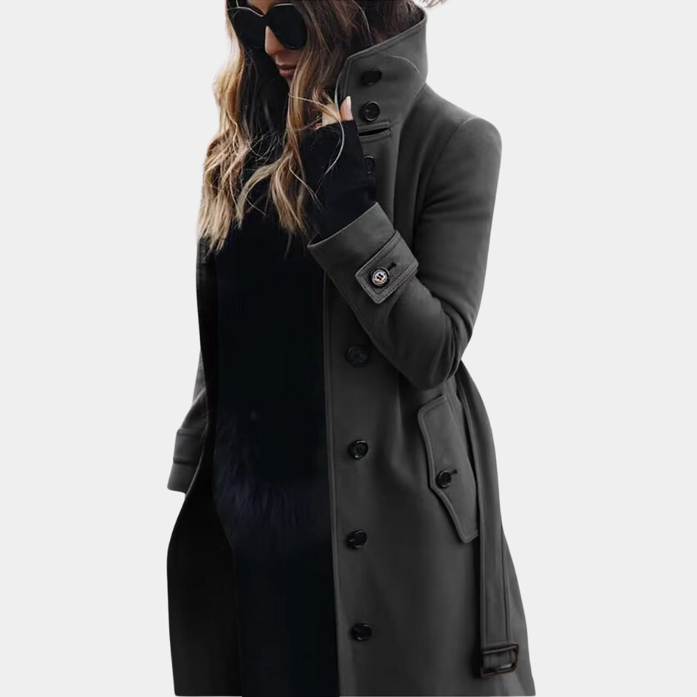 Long belted funnel neck coat in charcoal gray worn with a black top