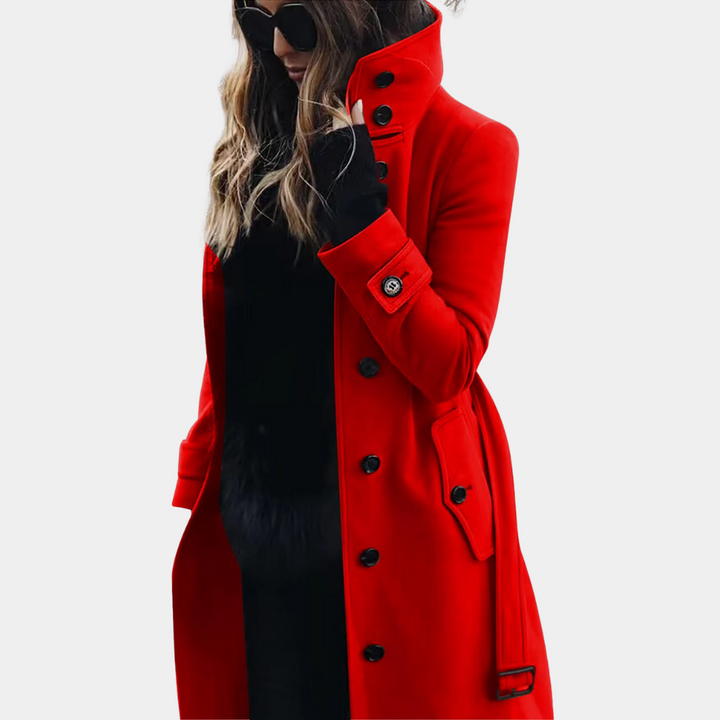 Red long belted coat with high funnel neck, styled with black gloves