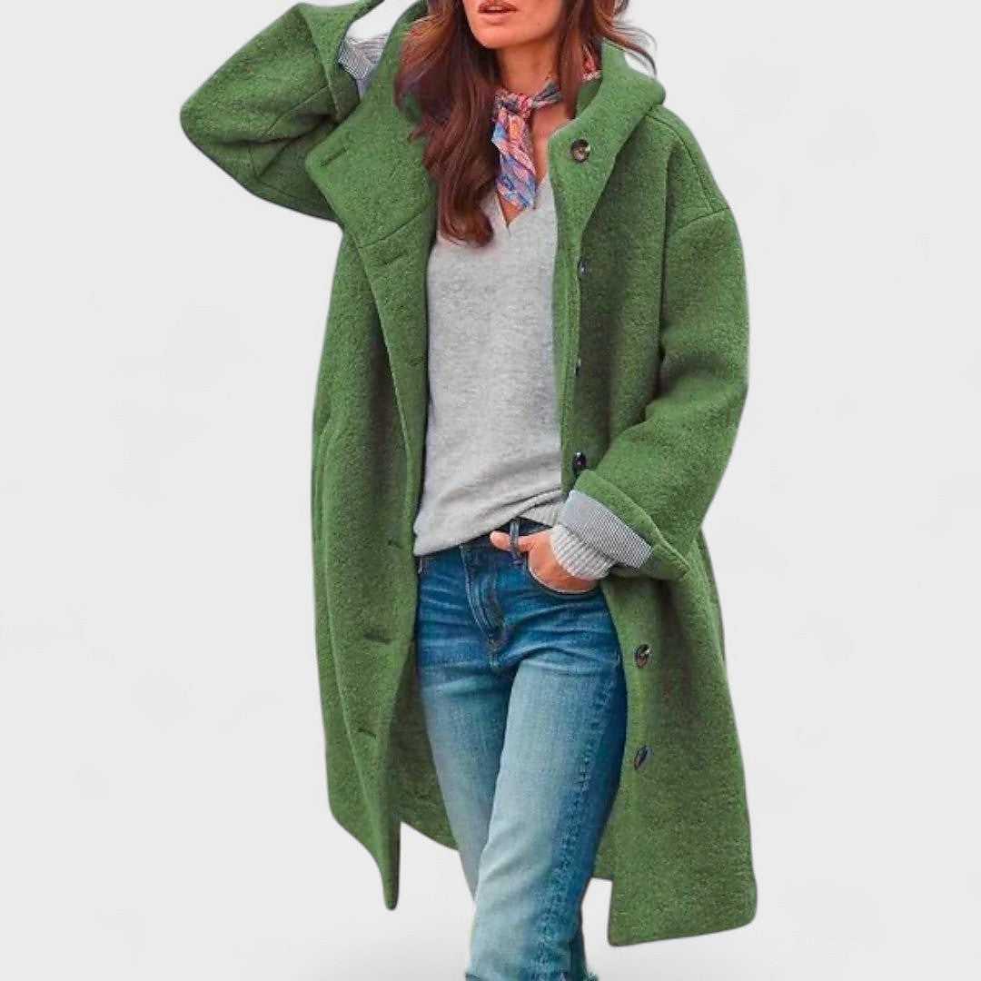Green oversized hooded coat with dropped shoulders and side pockets