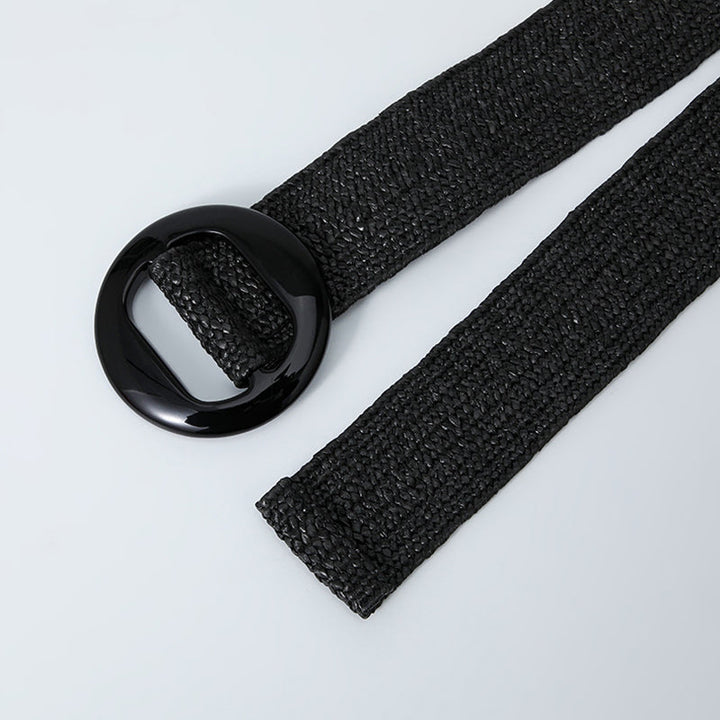 Black woven belt laid open to show the full length and buckle