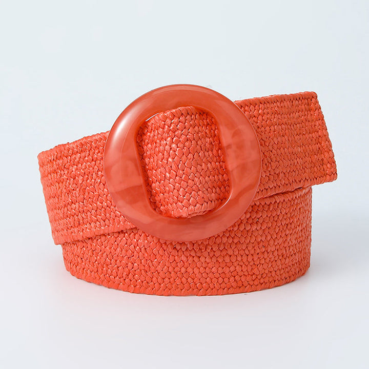 Orange woven belt with a matching round buckle