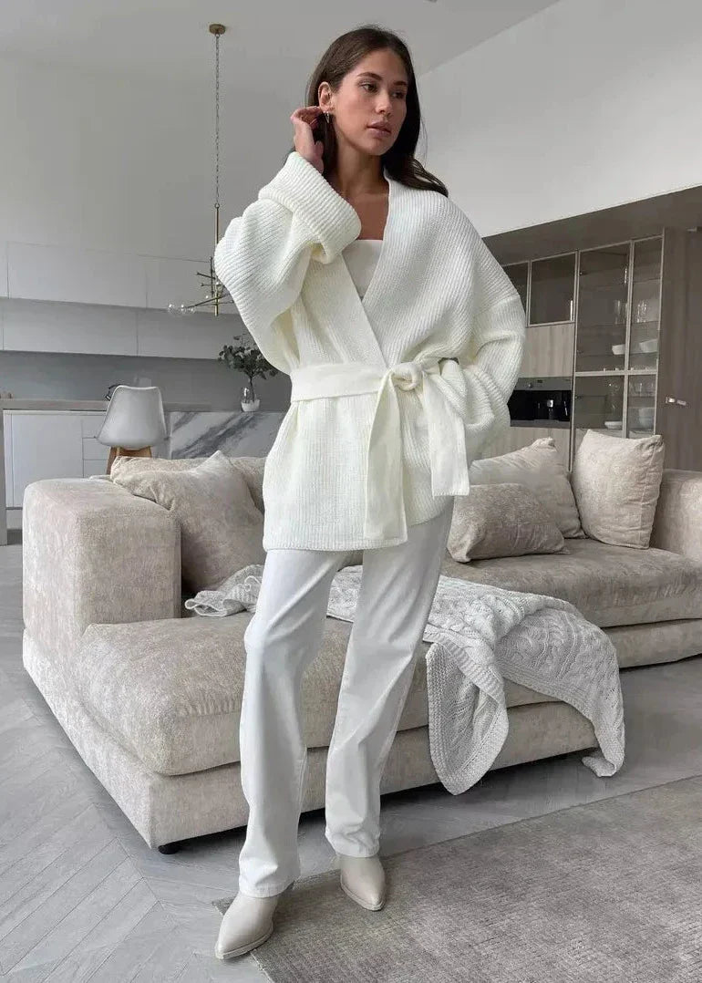 Full length view of the ivory wrap cardigan with folded cuffs