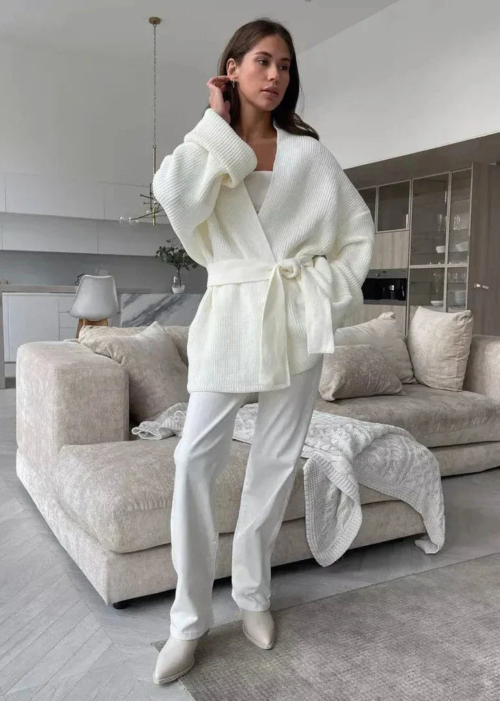 Full length view of the ivory wrap cardigan with folded cuffs