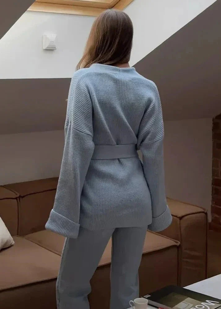 Back view of the light blue wrap cardigan with the tie belt at the waist
