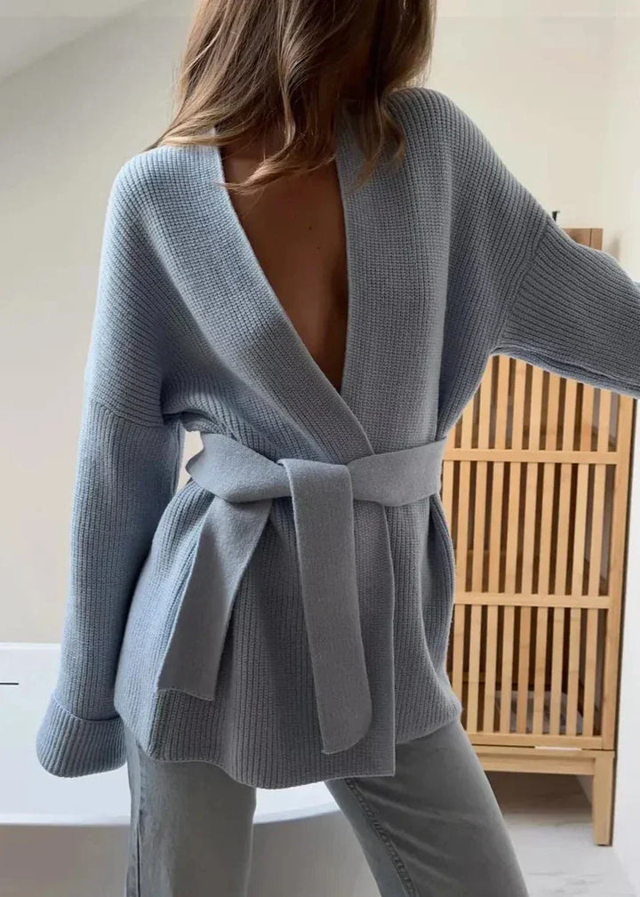 Light blue rib knit cardigan tied at the waist with wide cuffed sleeves